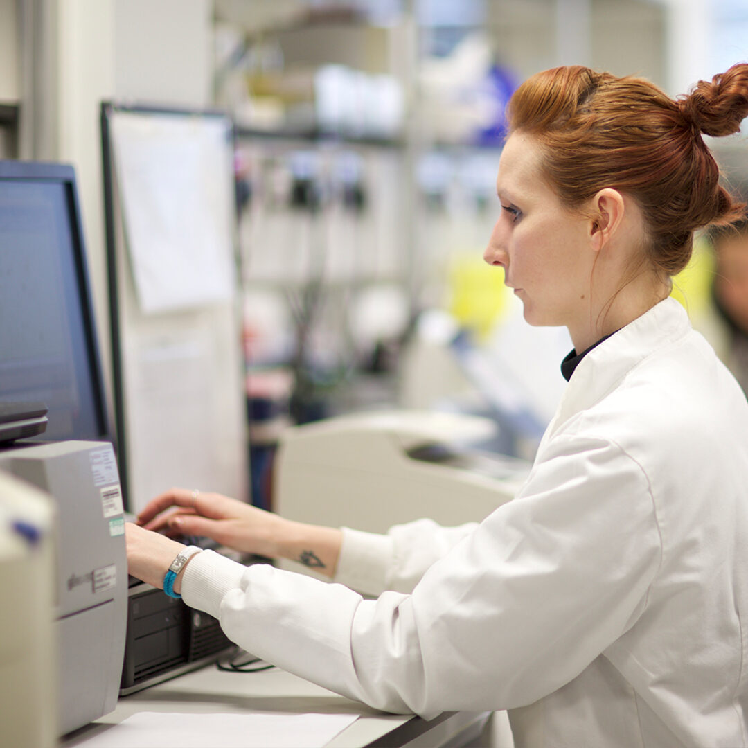 Scientist in the laboratory analysing data