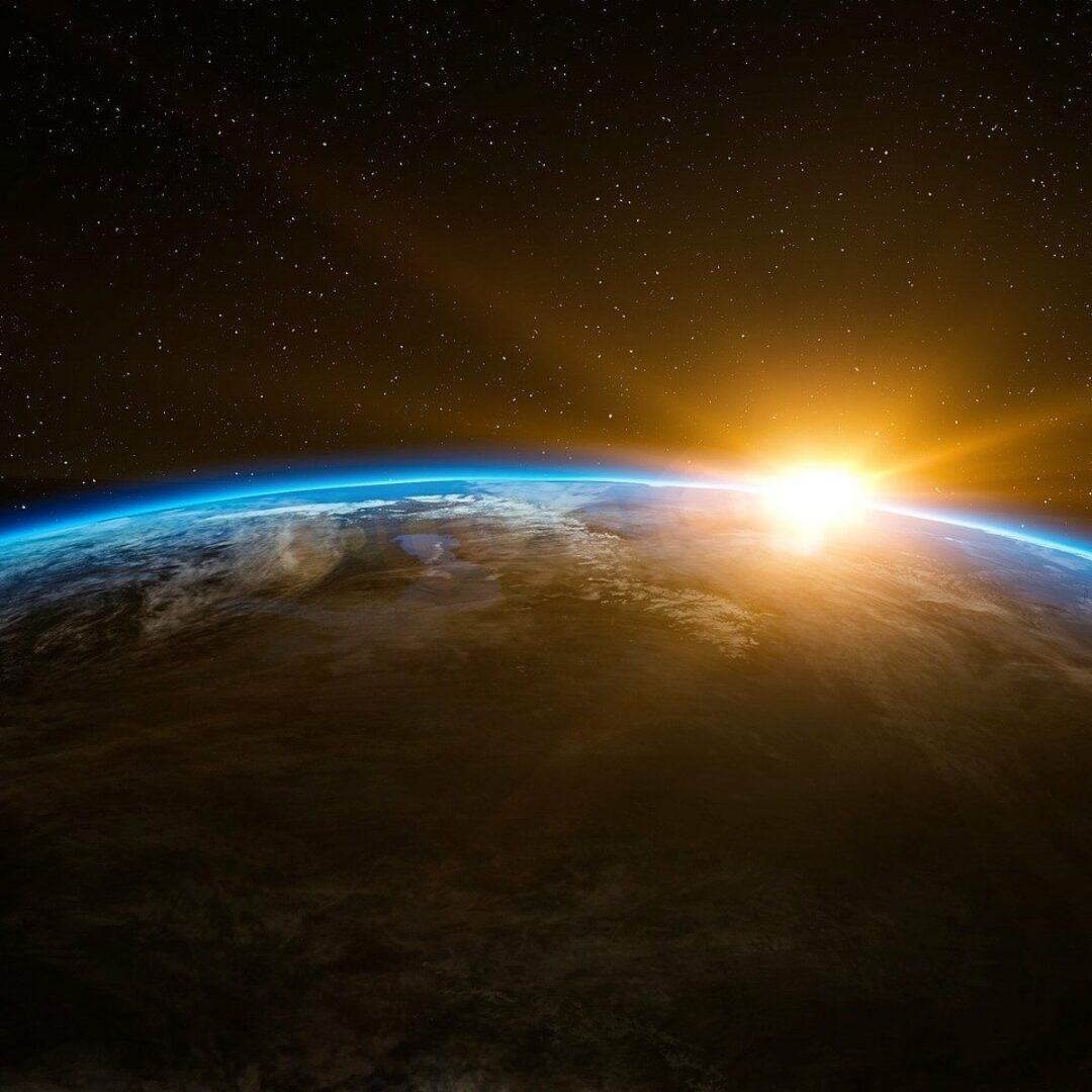 Earth with sunbeam on horizon