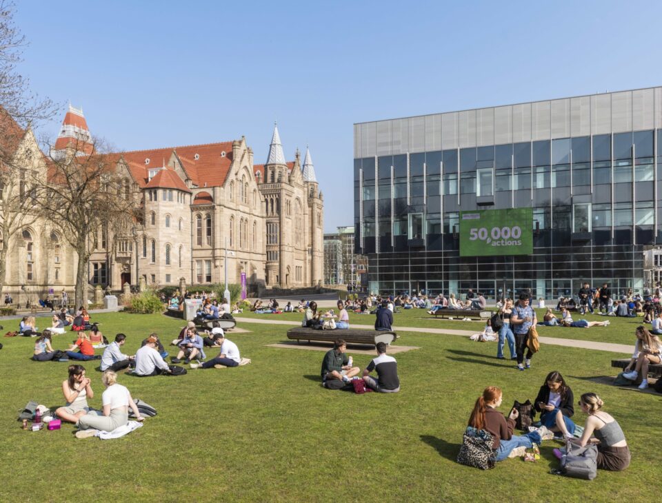 Students relaxing near the University of Manchester Whitworth Building