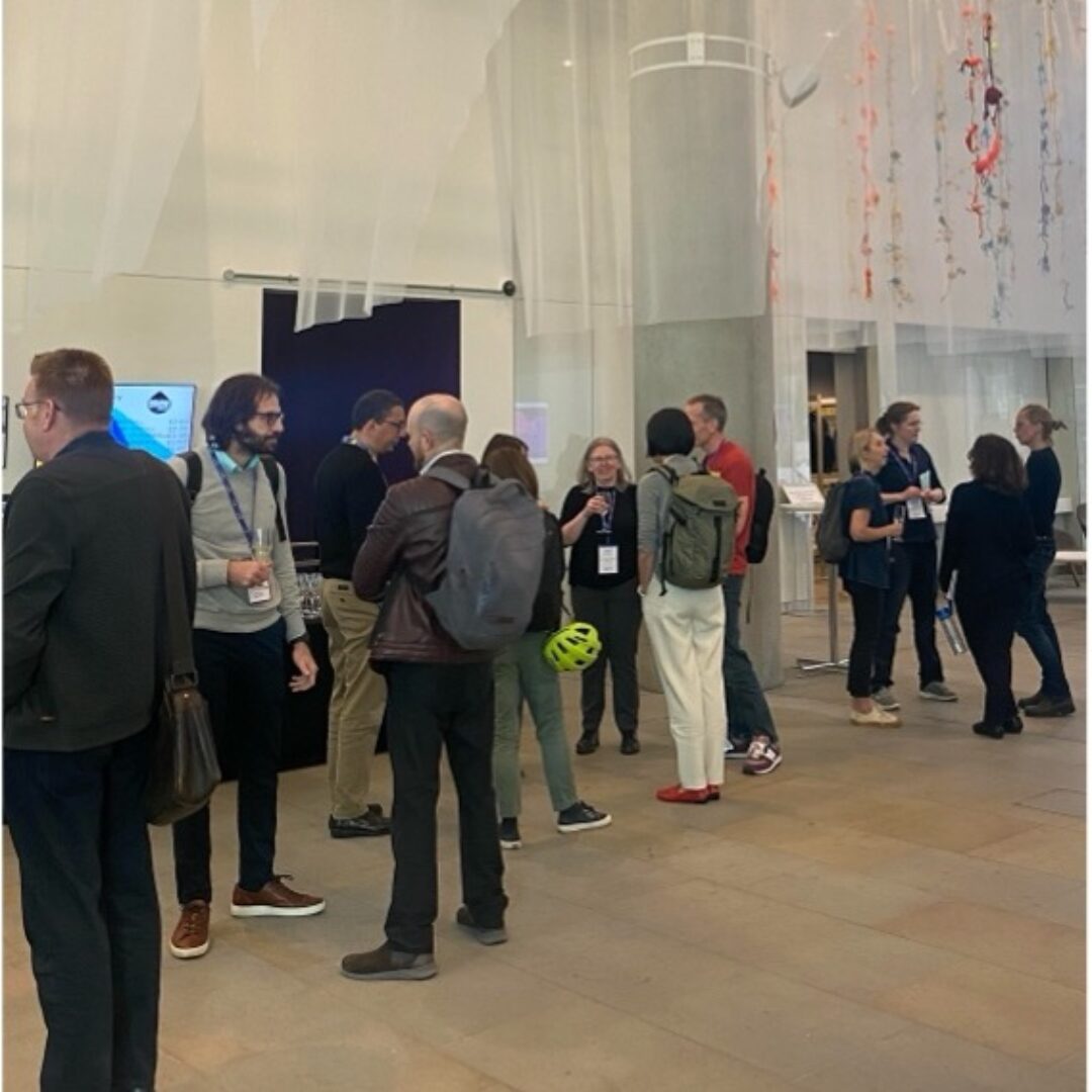 Attendees networking at the Cancer and the Host conference