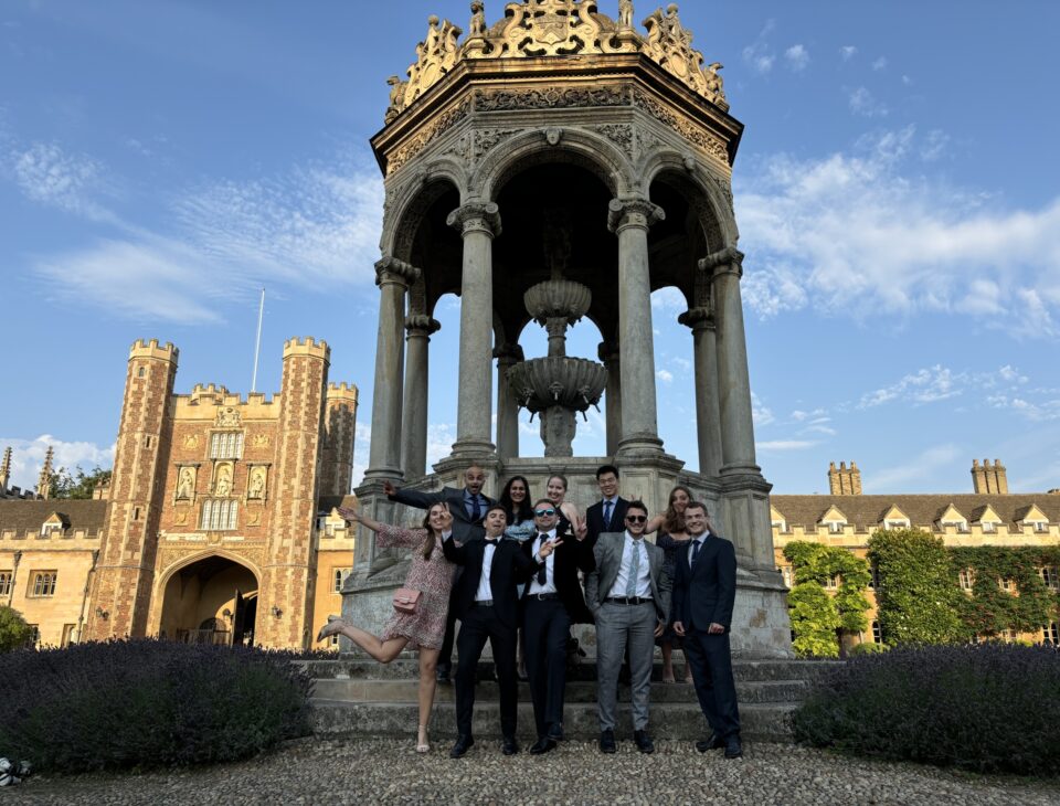 Vlasios celebrating with a group of friends during a summer lab internship in Cambridge.